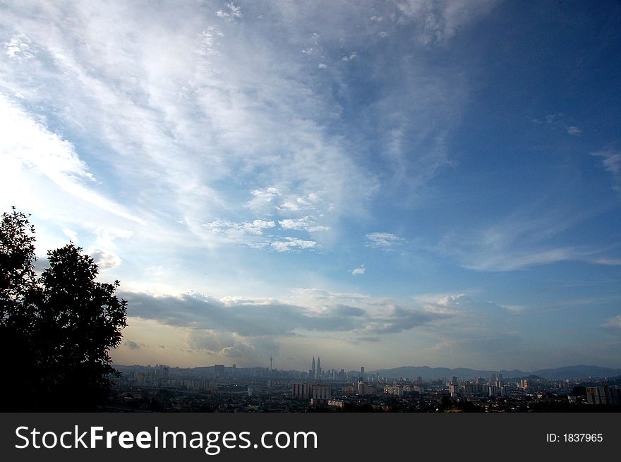 Skyline of Kuala Lumpur in evening with slight hazy in the background. Skyline of Kuala Lumpur in evening with slight hazy in the background