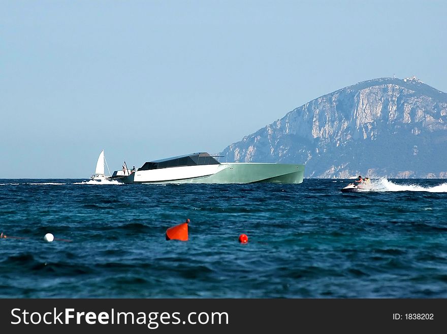 Luxurious boat on vacation cruising in blue sea. Luxurious boat on vacation cruising in blue sea