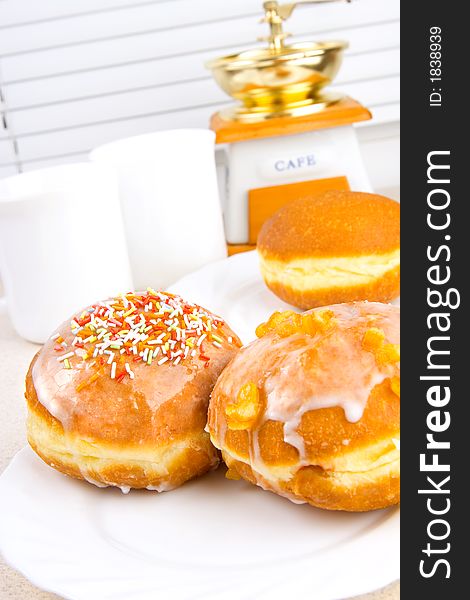 A tasty donuts and a kitchen objects. A tasty donuts and a kitchen objects.