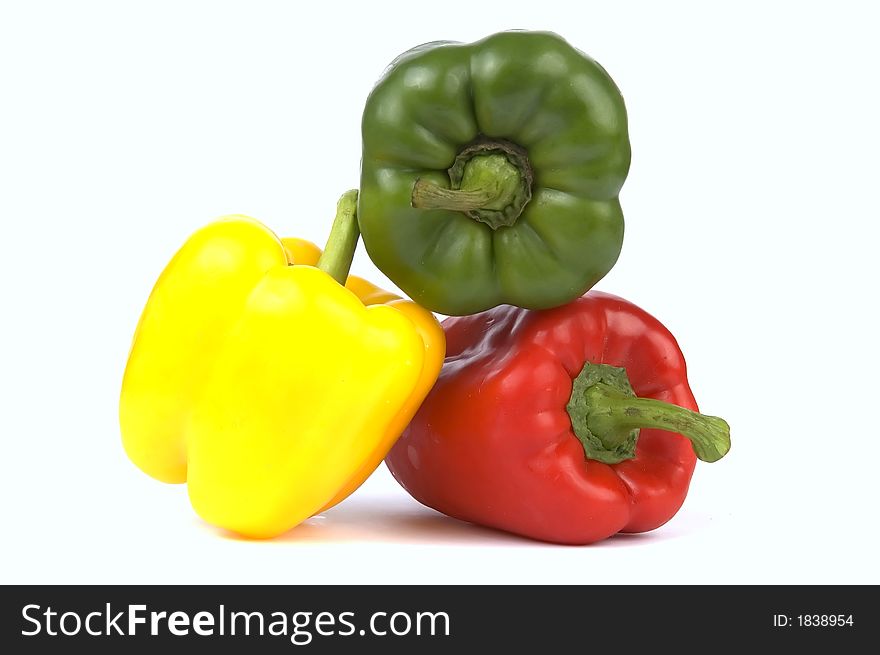 Yellow, green and red pepper isolated on white background. Yellow, green and red pepper isolated on white background