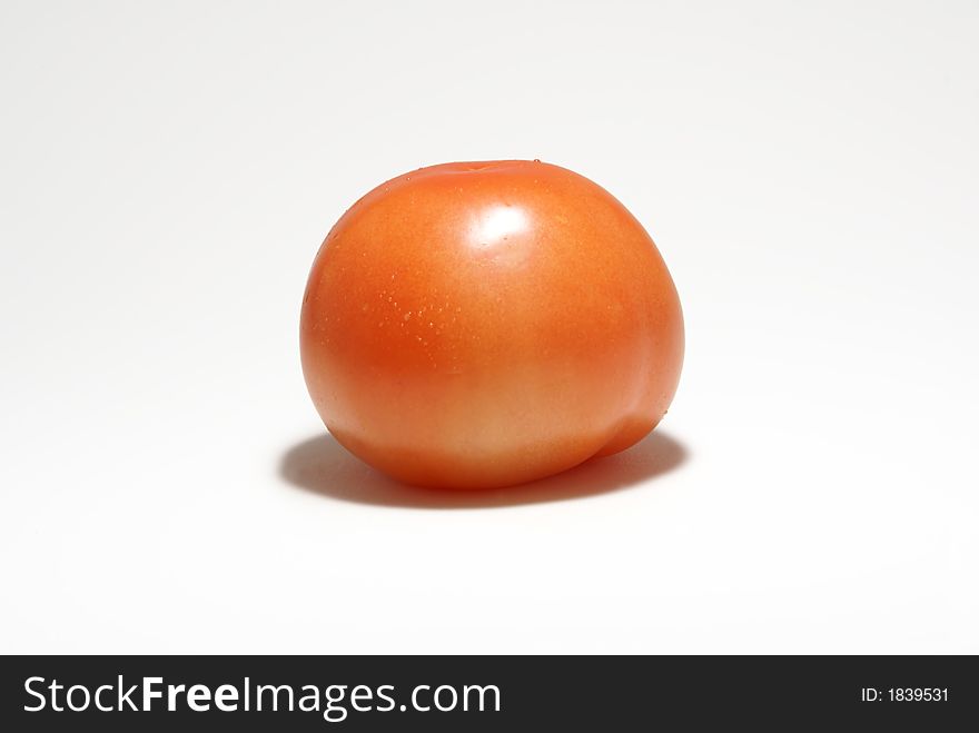 Lonely tomatoe isolated on white