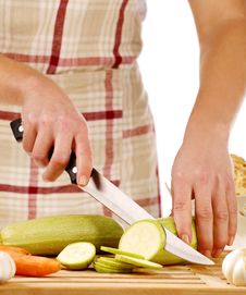 Girl Cutting Gourd Stock Photography Girl Cutting Gourd Stock Photography