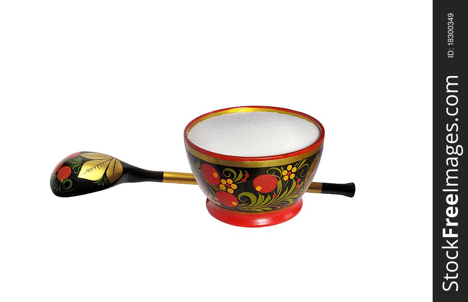 Wooden painted spoon and saltcellar with salt