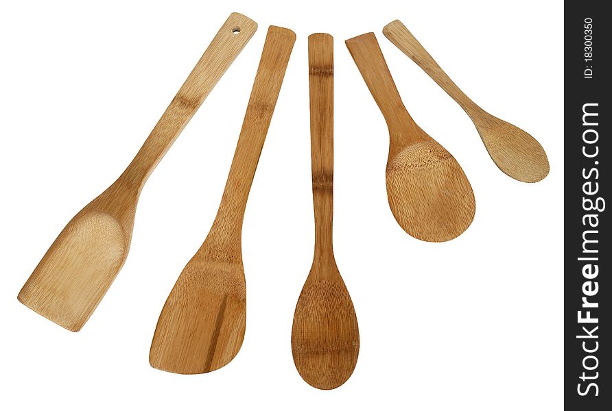 A set of five bamboo spoons isolated on a white background. Clipping path included. A set of five bamboo spoons isolated on a white background. Clipping path included.
