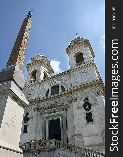 The church of TrinitÃ  dei Monti with the ancient Egyptian obelisk, near the Spagna's square in Rome. The church of TrinitÃ  dei Monti with the ancient Egyptian obelisk, near the Spagna's square in Rome