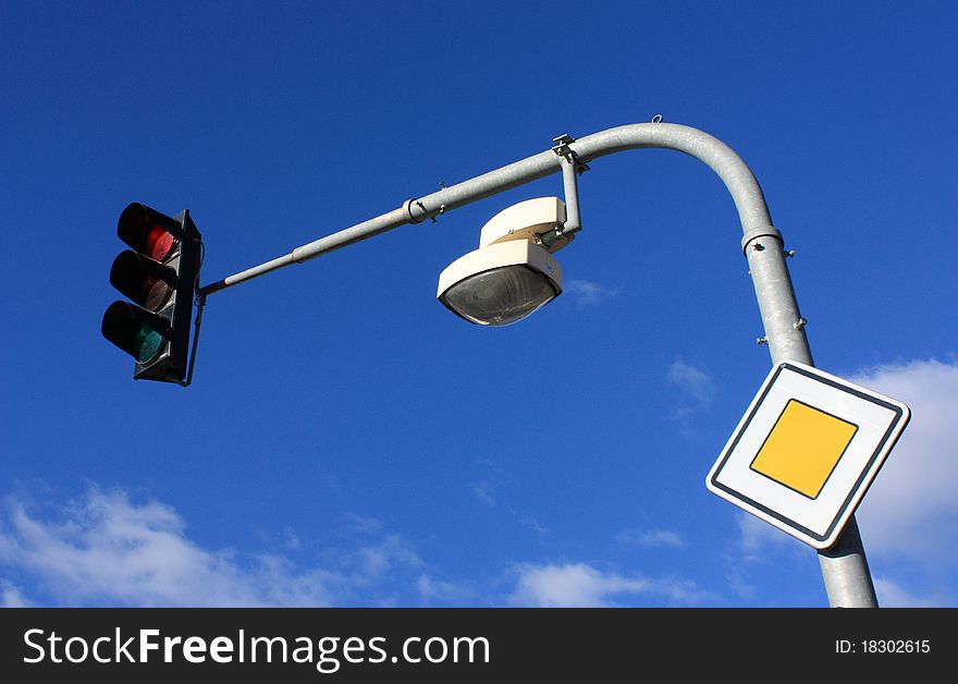 Traffic lights on blue sky