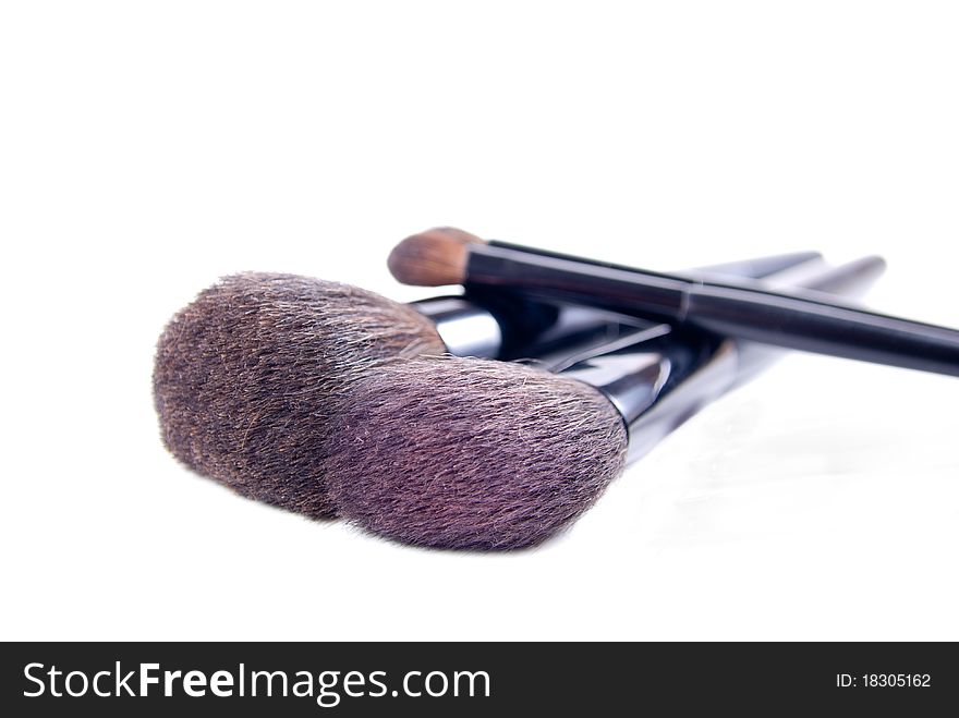 Brushes for a make-up, on a white background. Brushes for a make-up, on a white background