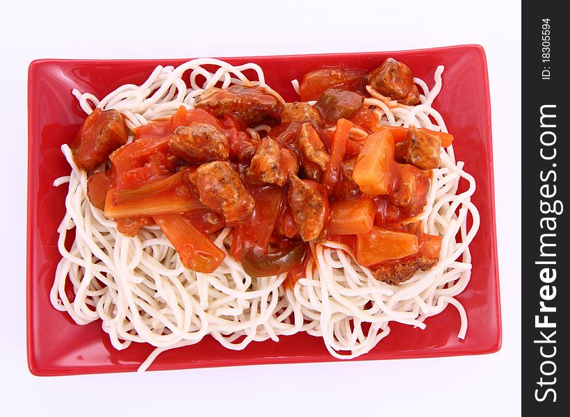 Chinese food - sweet and sour chicken with chow mein noodles