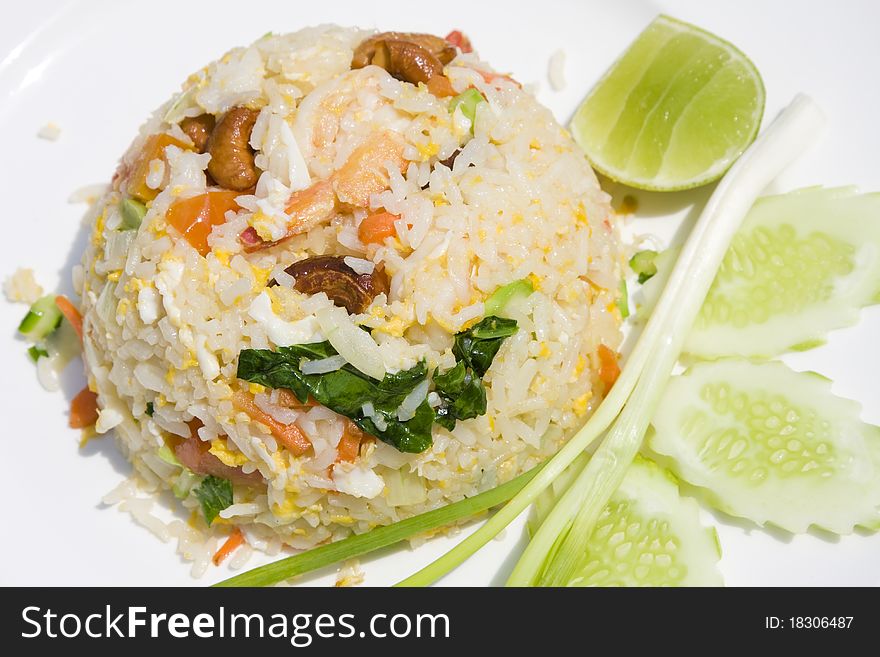 Rice with seafood in a white plate