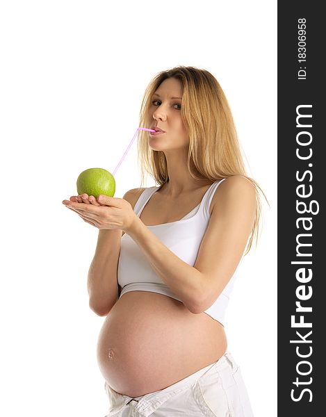 Pregnant Woman Drinking Juice From Apple