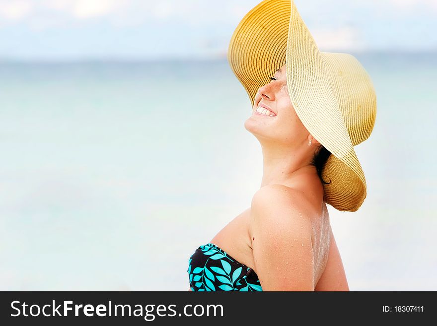 Young happy woman on sea background. Young happy woman on sea background