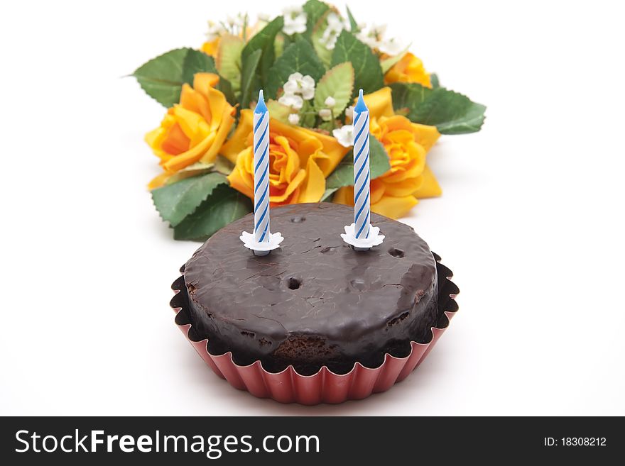 Cake with birthday candle with flowers