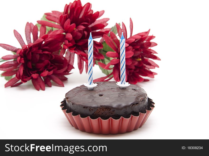 Cake with birthday candle with flowers