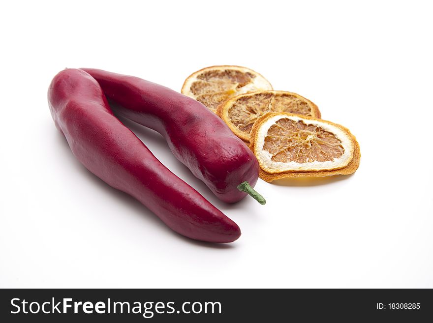 Red chilli with cut lemon. Red chilli with cut lemon