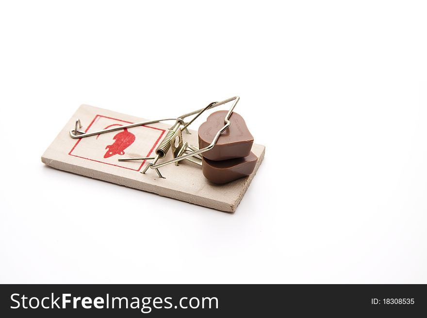 Chocolates with heart in the mousetrap. Chocolates with heart in the mousetrap