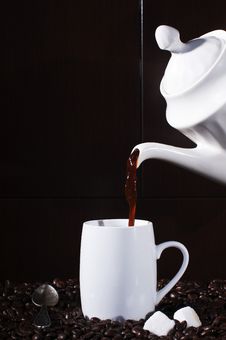 Pouring Hot Coffee To A Cup Stock Photos Pouring Hot Coffee To A Cup Stock Photos