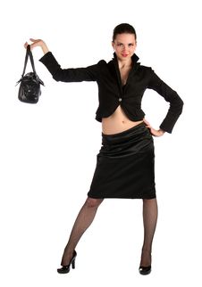 Girl In Black Suit Demonstrate Bag. Royalty Free Stock Photo
