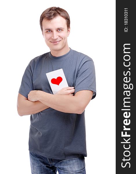 Smiling man holding valentine's card standing on a white background. Smiling man holding valentine's card standing on a white background