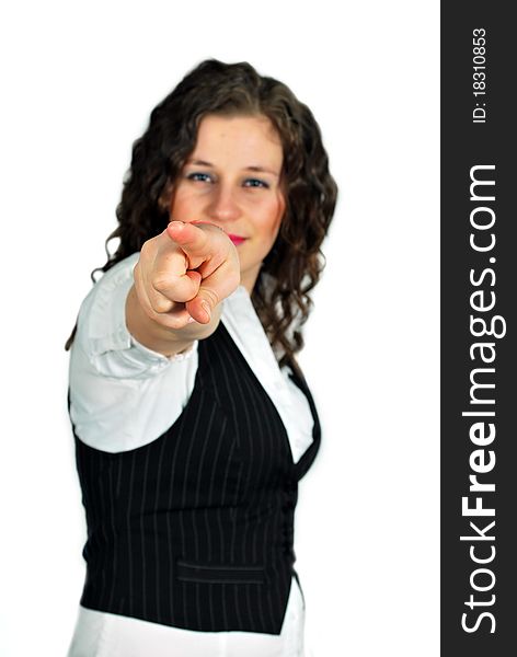 Smiling business woman pointing finger at you. Smiling business woman pointing finger at you