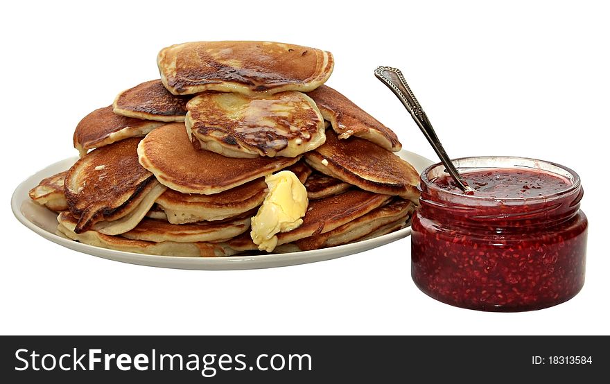 Pancakes and bowl with sour cream isolated on a white background. Pancakes and bowl with sour cream isolated on a white background
