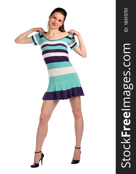 Girl in stripy blue dress move dress on shoulders. Isolated on white.