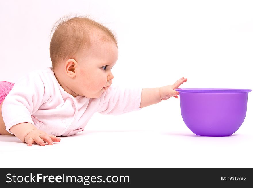 Little child baby and tableware. On white background.