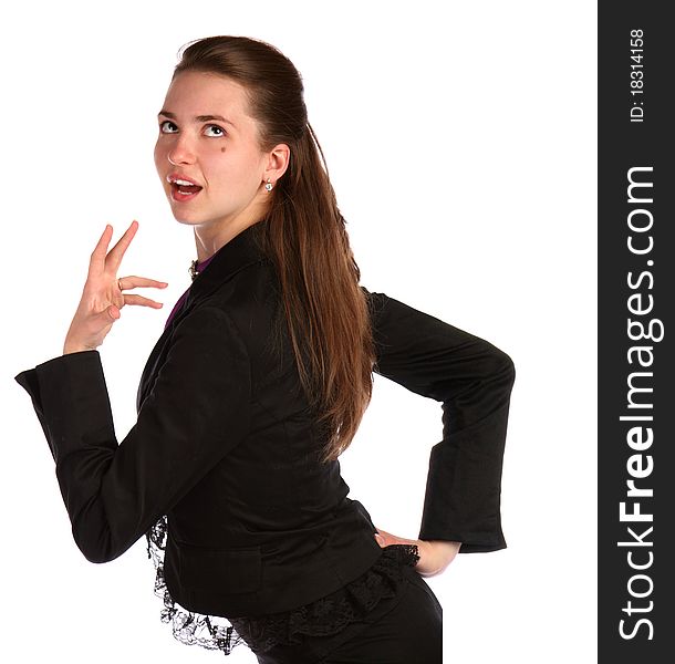 Girl in black suit posing. Isolated on white.