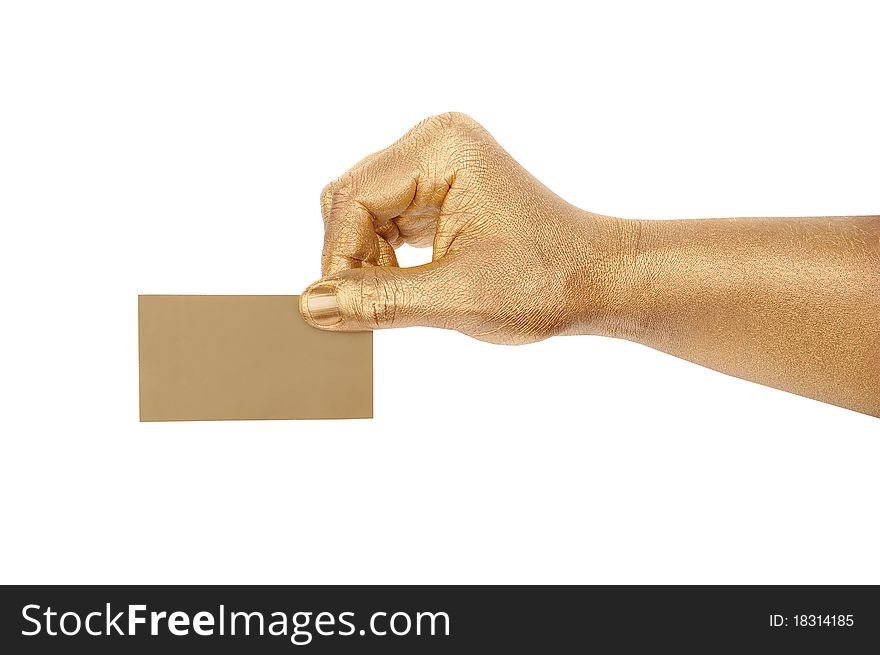 Man's golden hand holding an empty business card over white background