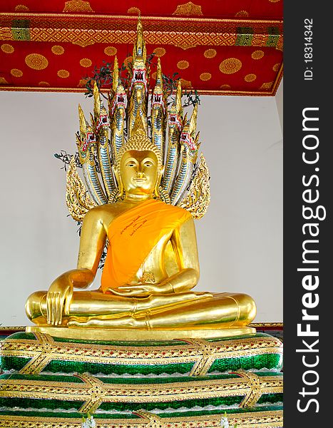 Golden Buddha with dragon heads in Bangkok. Golden Buddha with dragon heads in Bangkok