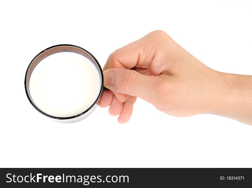 The man's hand holds a cup with milk. Isolated on the white