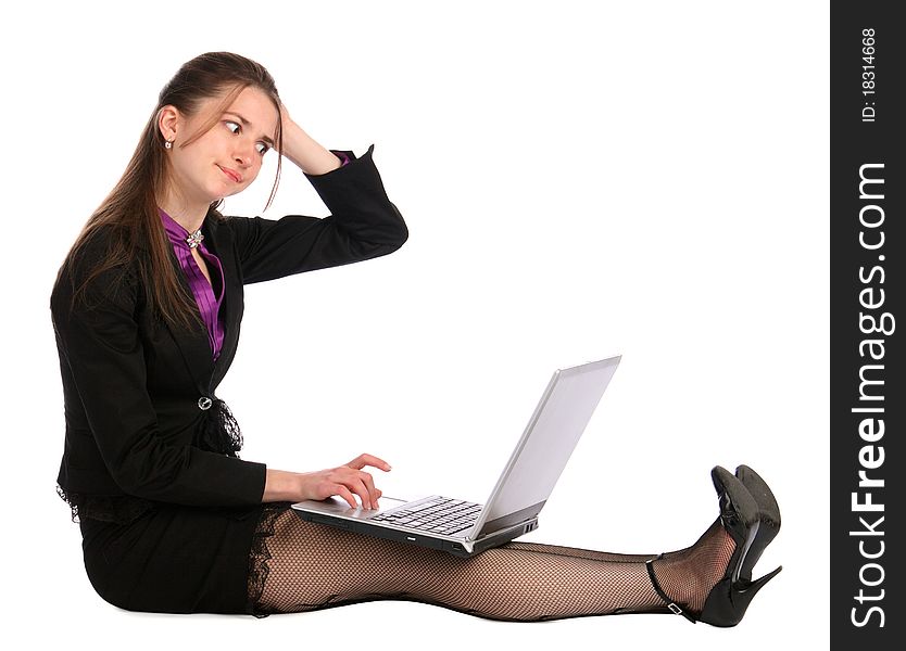 Girl in black suit sits on floor with notebook and thinks. Isolated on white. Girl in black suit sits on floor with notebook and thinks. Isolated on white.