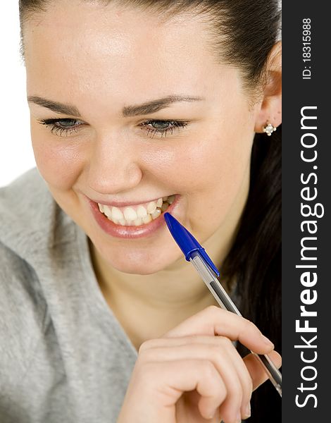 Young happy woman with pen in gray shit