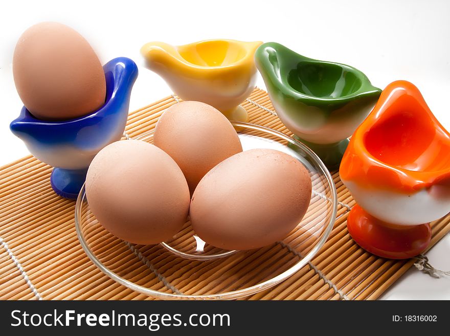 Easter eggs on the plate with holders