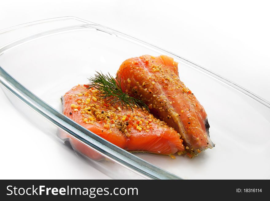 Raw isolated salmon with herbs