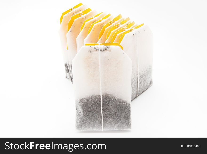 Tea bags with yellow labels