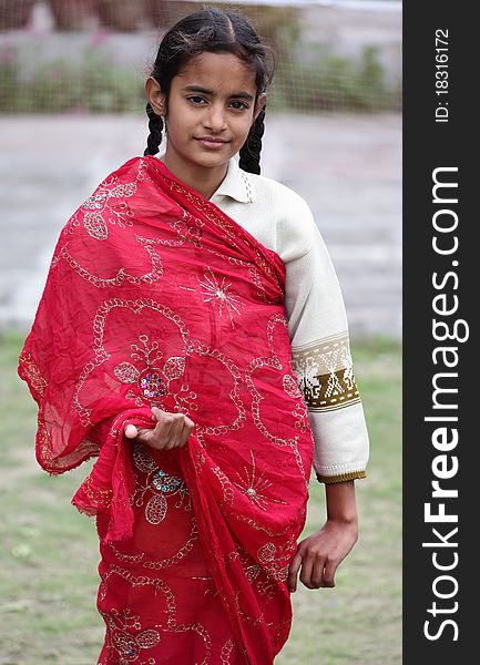 Girl draped in saree looking beautiful. Girl draped in saree looking beautiful.