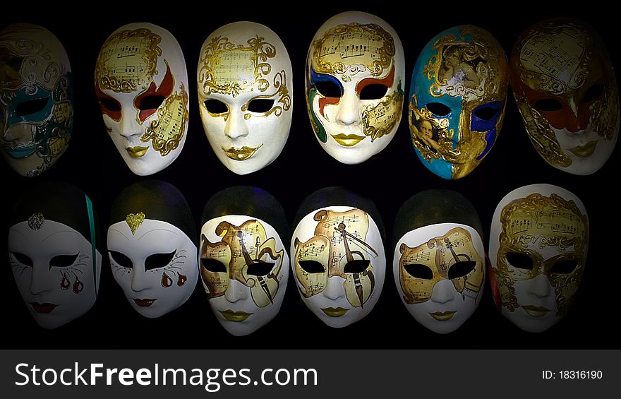 Different masks of the Carnival of Venice with a black background. Different masks of the Carnival of Venice with a black background