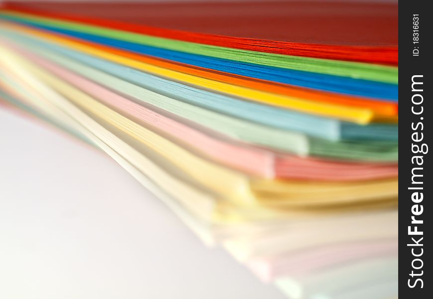 Close-up of colourful paper on a stack. Close-up of colourful paper on a stack