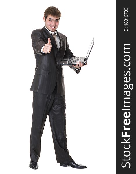 Businessman holding laptop and shows okay sign