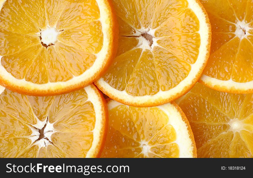 Oranges Slices are on board. Background. Texture.