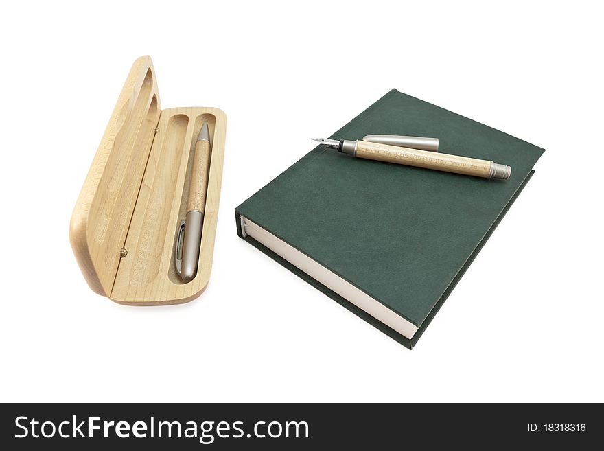 Pencil box and notepad isolated on white background