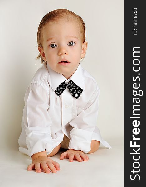 Cute little caucasian boy in a white shirt. Cute little caucasian boy in a white shirt