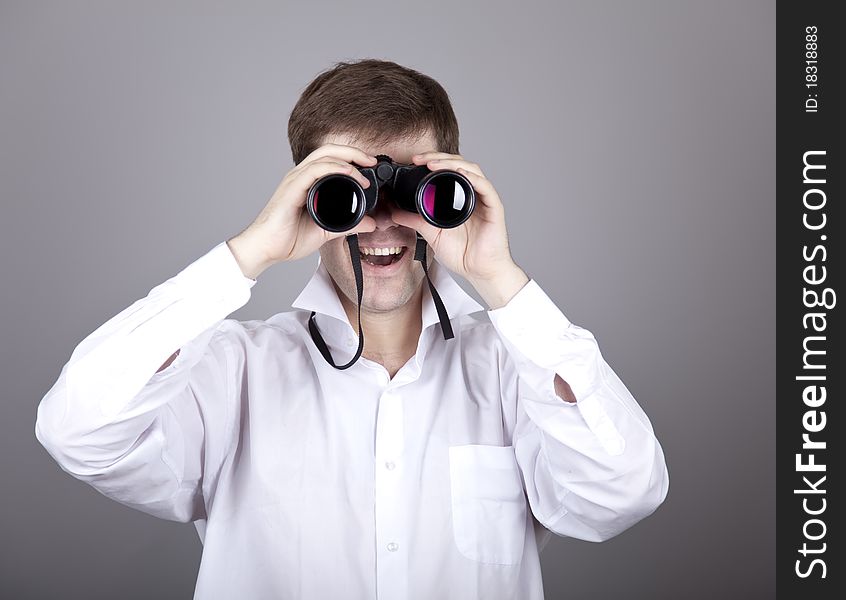 Young Businessmen In T-shirt With Black Binocular