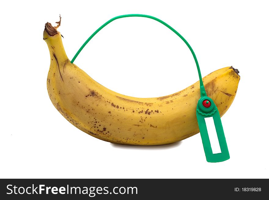 Banana with a label on a white background. Banana with a label on a white background