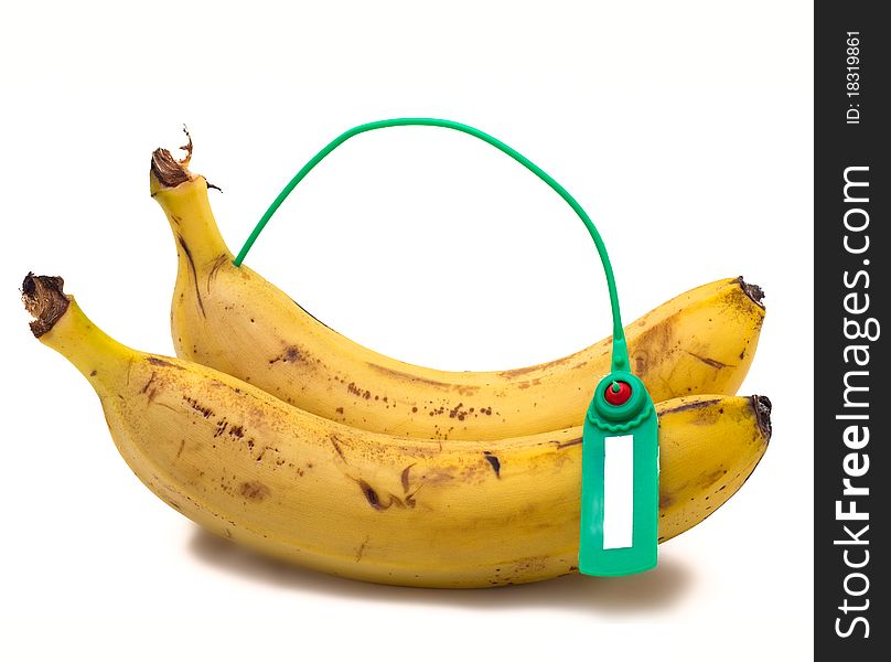 Banana with a label on a white background. Banana with a label on a white background