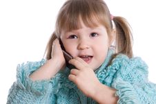 The Little Girl Speaks By Phone Stock Photo The Little Girl Speaks By Phone Stock Photo