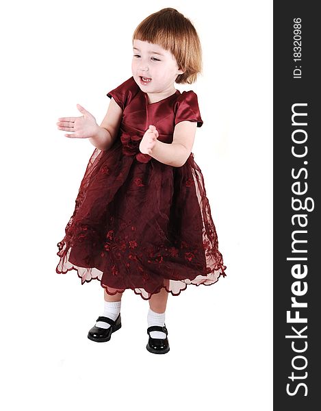 A sweet little girl, three years old, in a nice burgundy dress having fun, for white background. A sweet little girl, three years old, in a nice burgundy dress having fun, for white background.