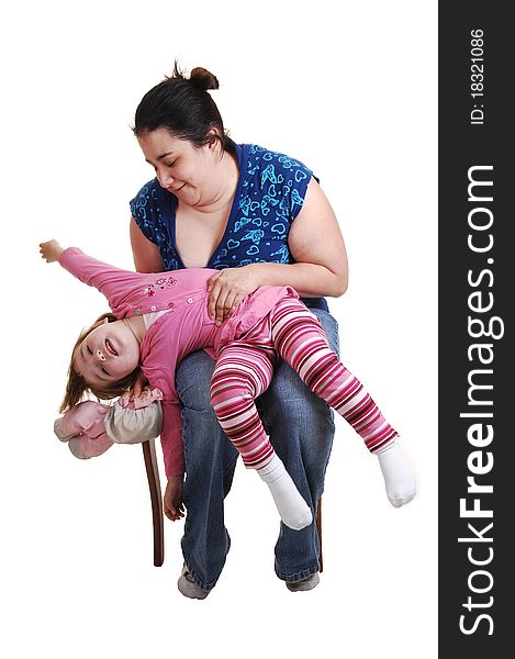 Mother and daughter having fun in the studio, for white background. Mother and daughter having fun in the studio, for white background.