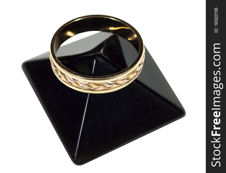 Wedding ring on a stone an obsidian