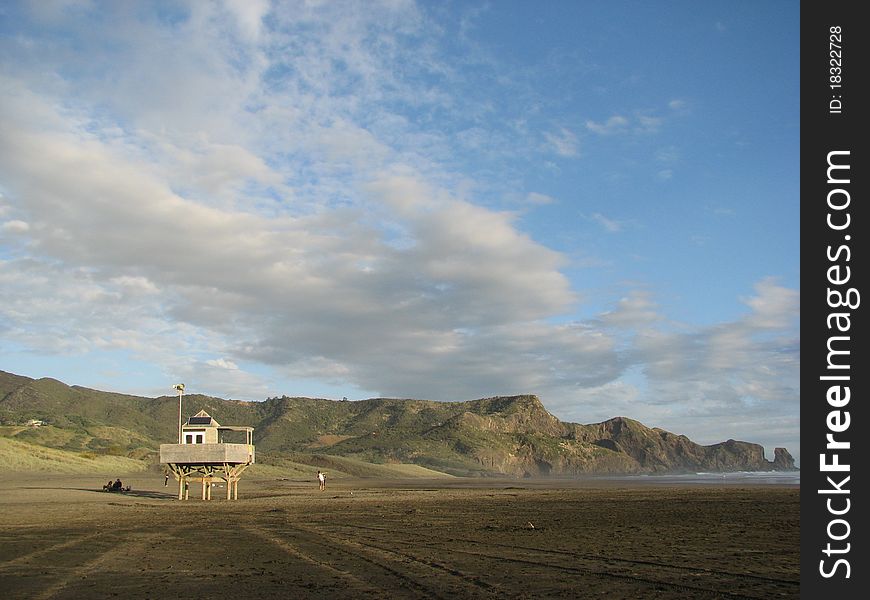 This is a wild West Coast beach in Auckland, New Zealand- very popular with surfers. This is a wild West Coast beach in Auckland, New Zealand- very popular with surfers.